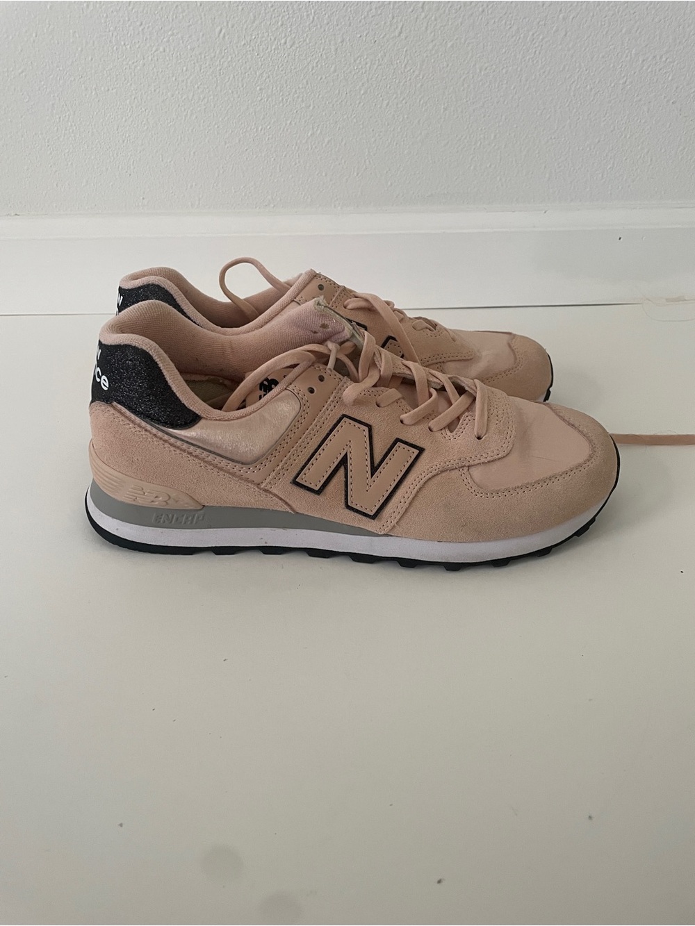 New Balance Women's Sneakers in Blush Pink and Black Accents